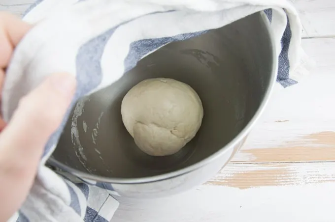 bread dough in a bowl to rise