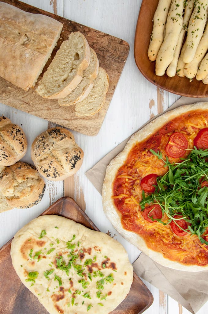 Pizza, Naan, Rolls, Bread Loaf and Garlic Herb Breadsticks made with the Multi-Purpose Bread