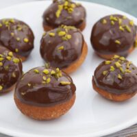 Vegan Donut Holes with chocolate and pistachios