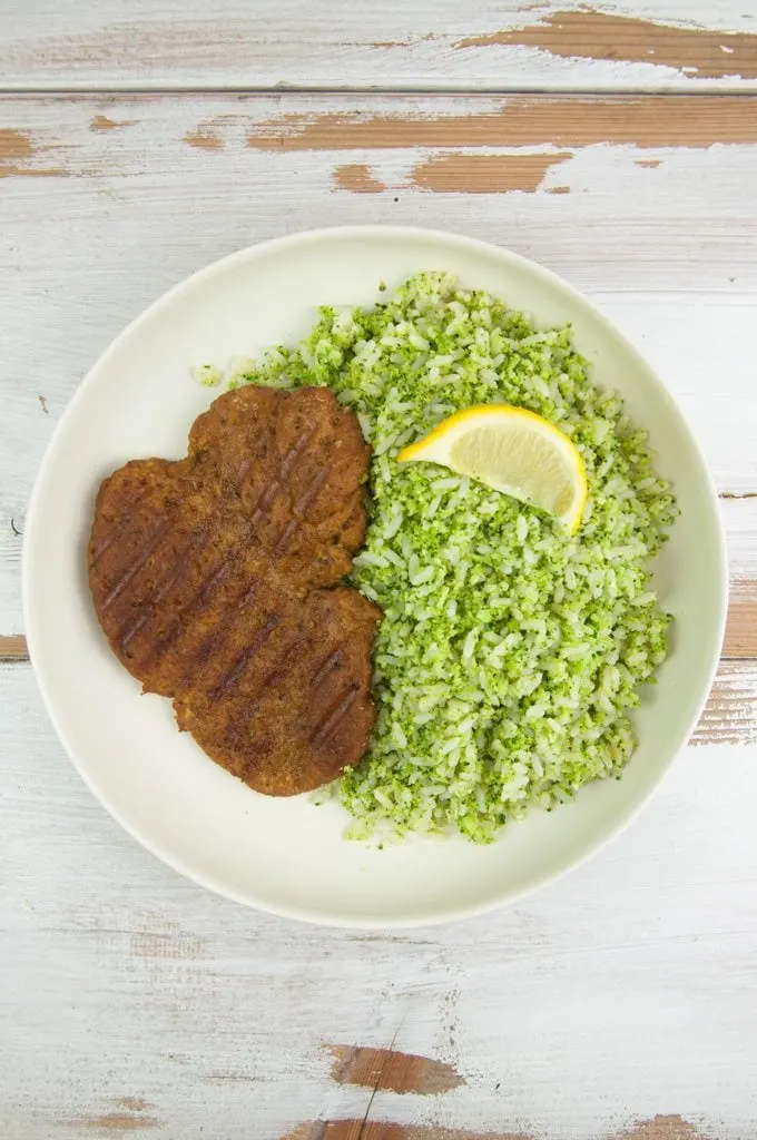 Broccoli Rice and Seitan Steak on a plate