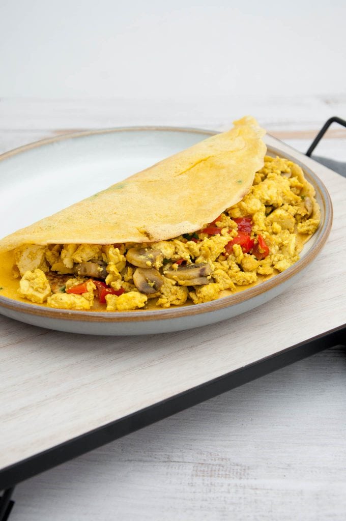 Tofu Scramble with Mushrooms and Bell Pepper in a chickpea omelet