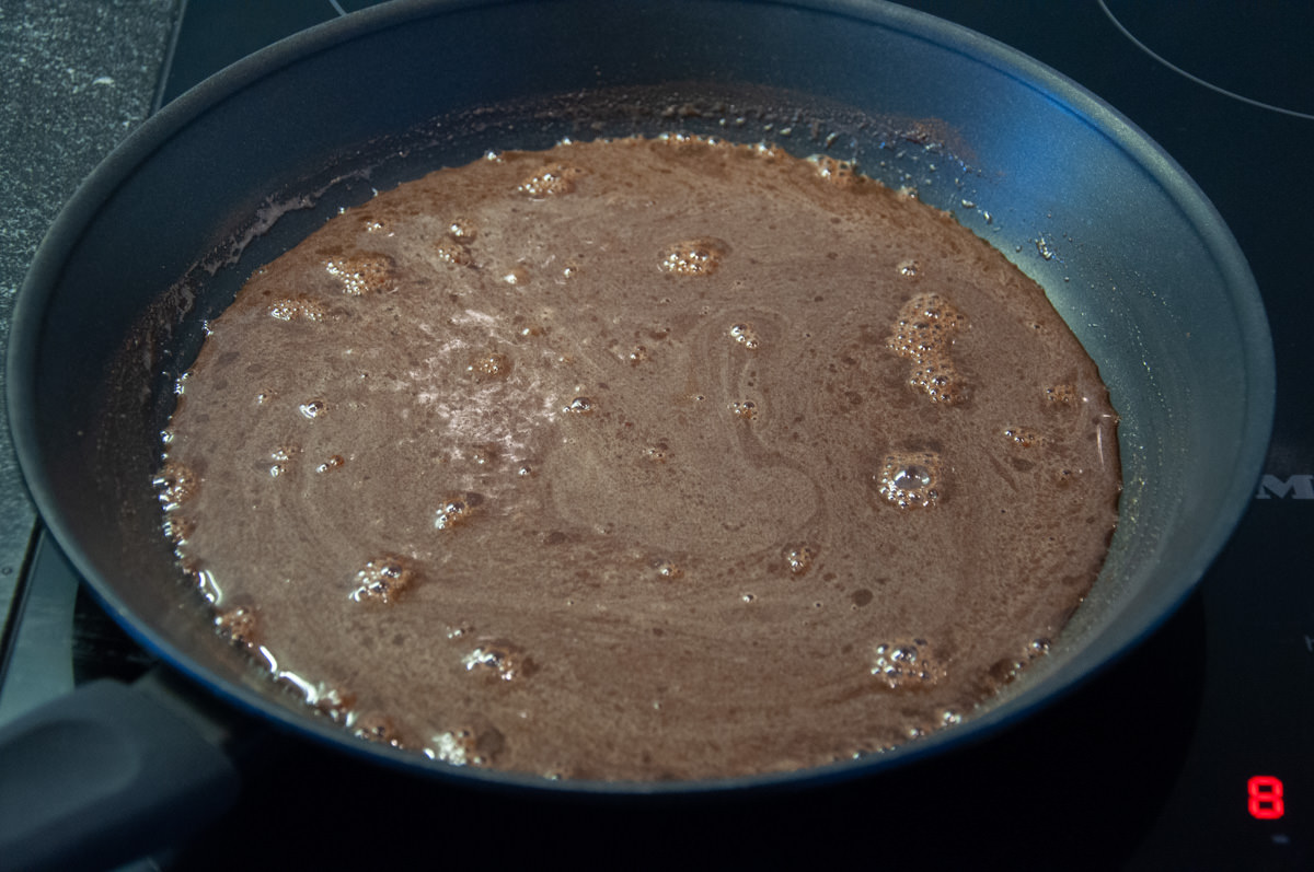 sugar, water, and cinnamon in a pan