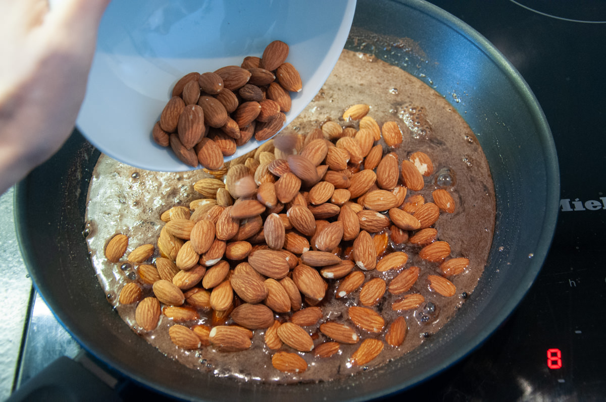 adding almonds to the cinnamon sugar water