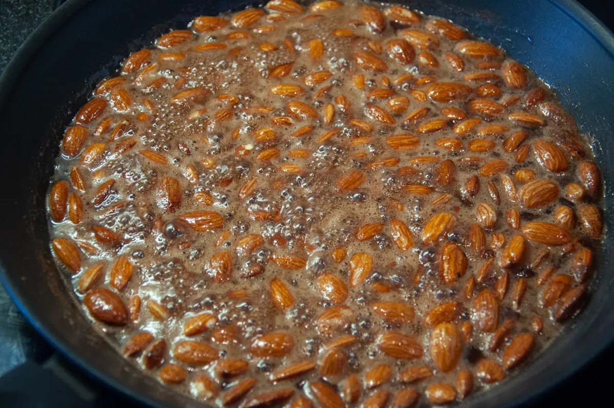 cooking sugar coated almonds in pan