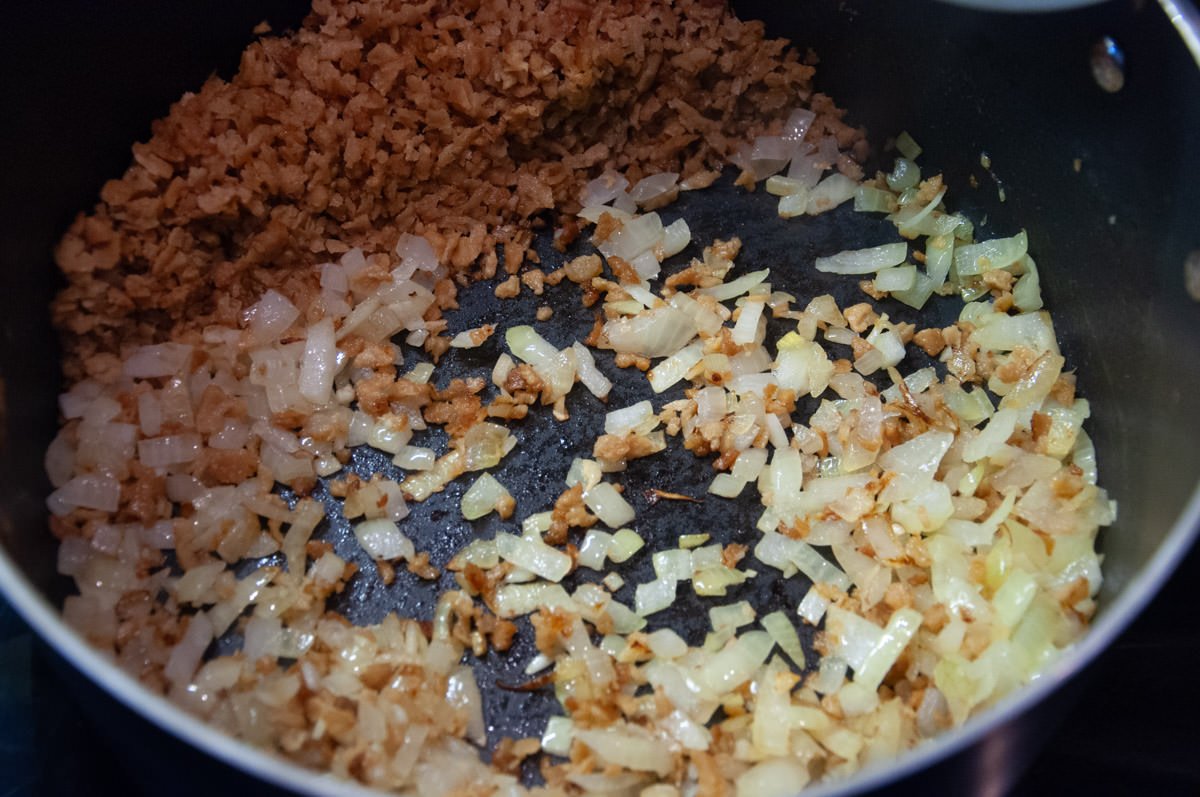 soy granule, onions and garlic in a pot