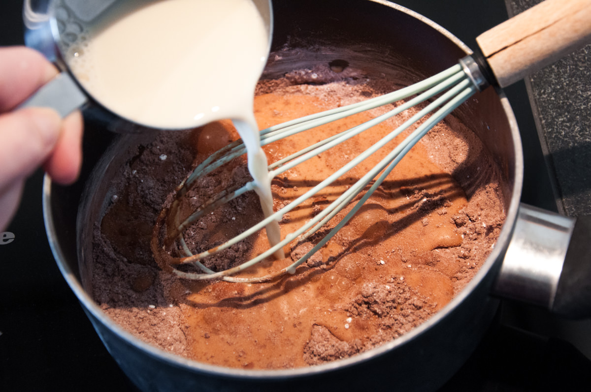 adding soy milk to the pudding