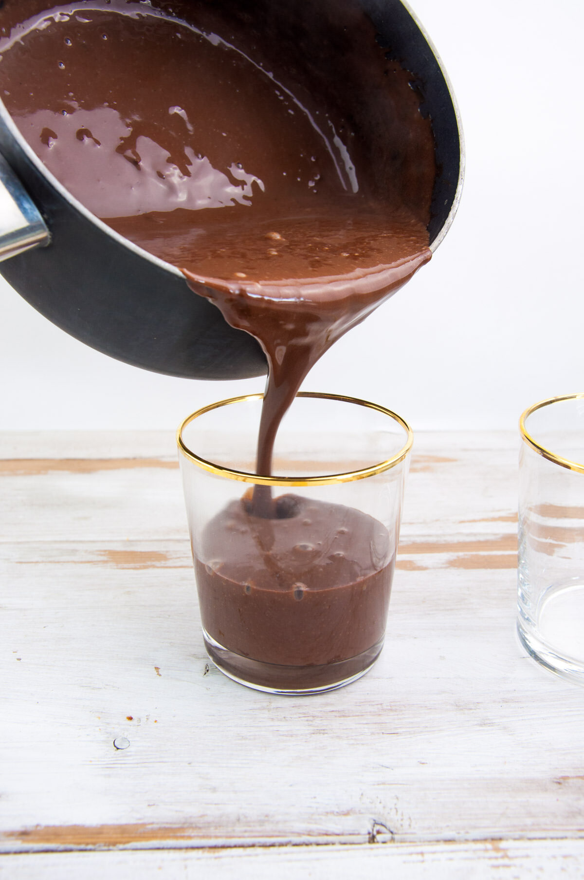 Pour pudding into glasses