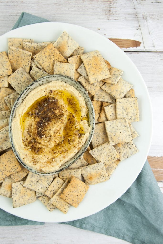 Vegan Poppy Seed Crackers served with Za'atar Hummus