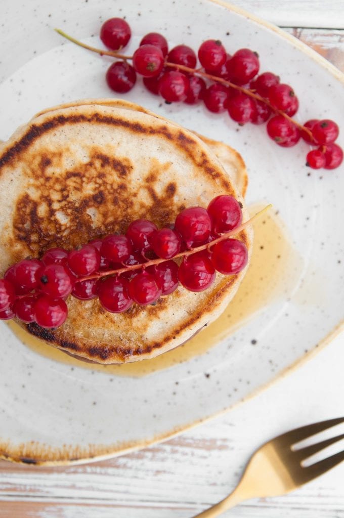 Vegan Cocoa and Vanilla Pancake Tower from the top with red currant