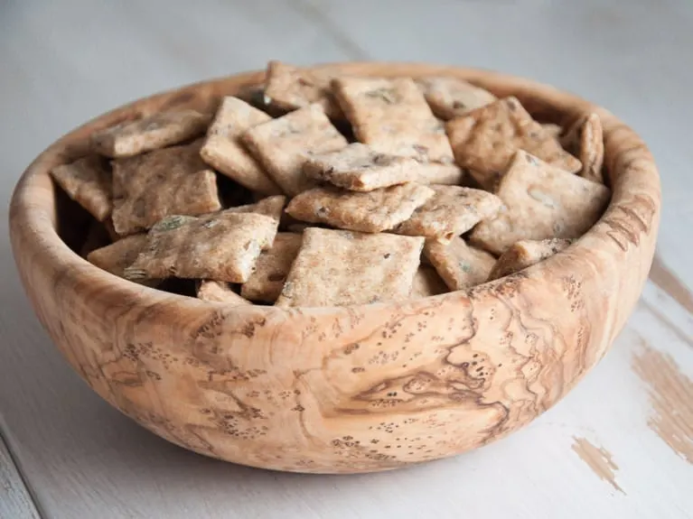 Whole Wheat Seed Crackers in a wooden bowl