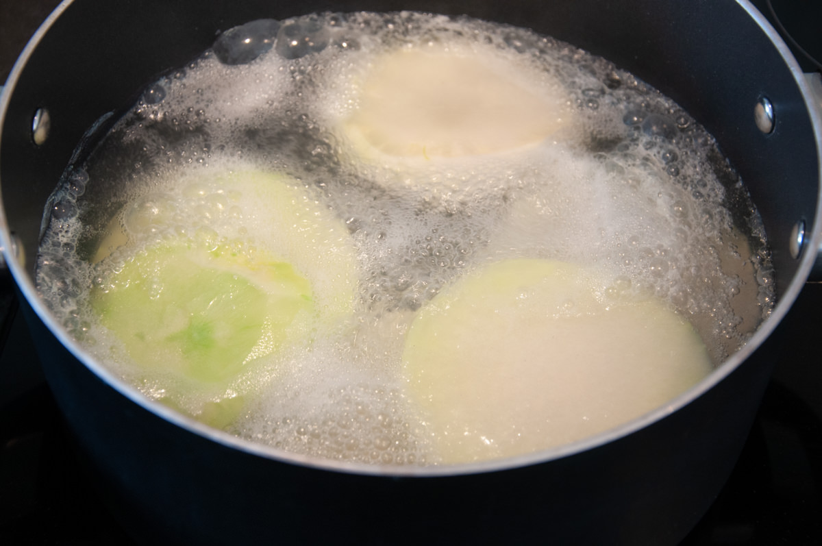 kohlrabi slices boiling in pot