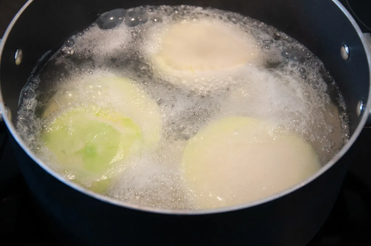 kohlrabi slices boiling in pot