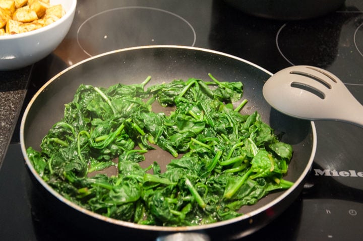 wilted spinach in pan