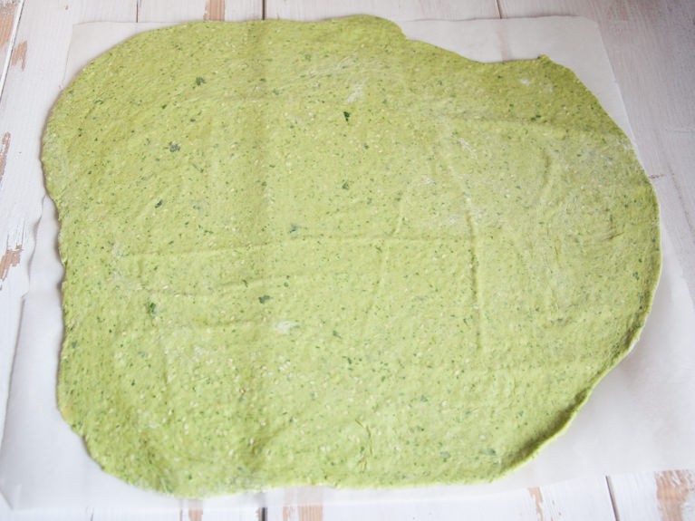 Vegan Spinach & Sesame Crackers rolled out green dough for making spinach crackers