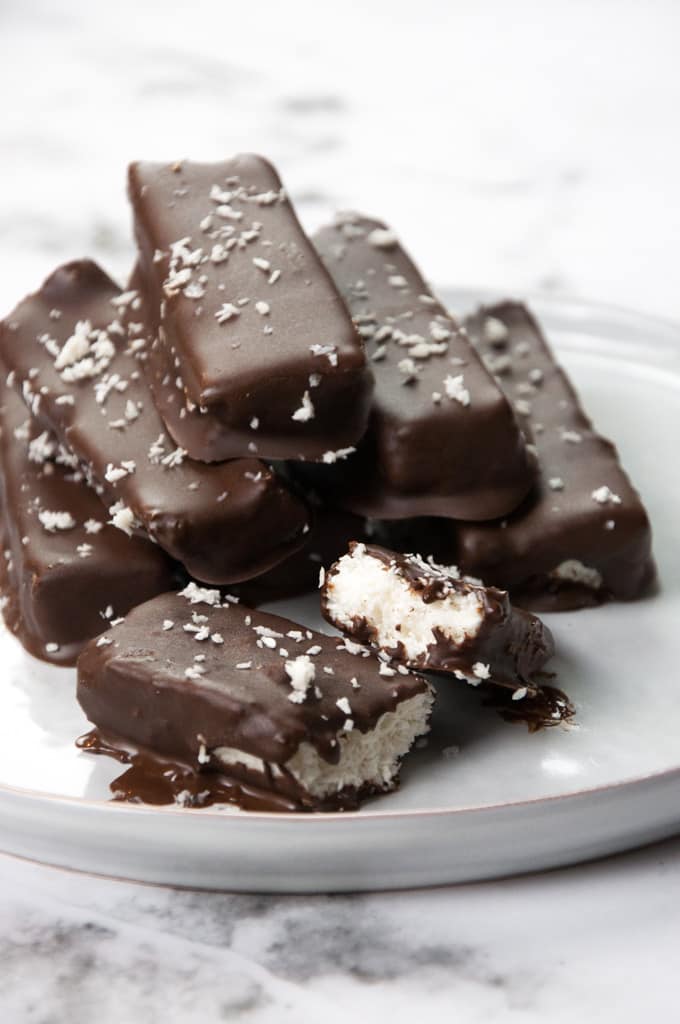 Homemade Vegan Bounty Bars sprinkled with coconut 