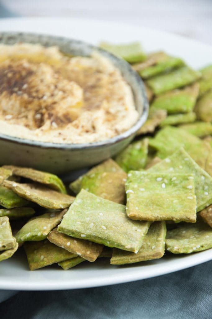 Vegan Spinach Sesame Crackers served with Zaatar Hummus