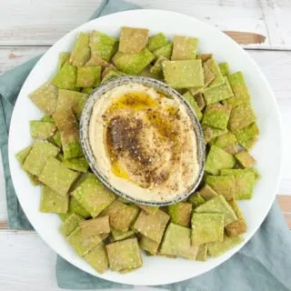 Vegan Spinach Sesame Crackers served with Zaatar Hummus