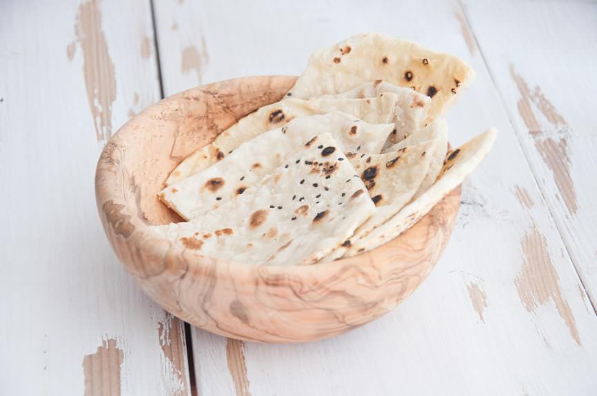 Sesame Naan in a wooden bowl