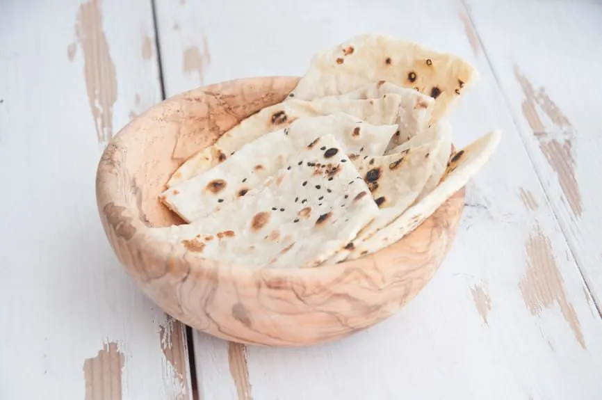Sesame Naan in a wooden bowl