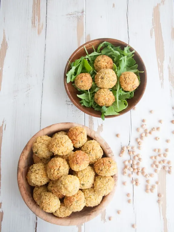 Oil-Free Falafel in a bowl and on a salad