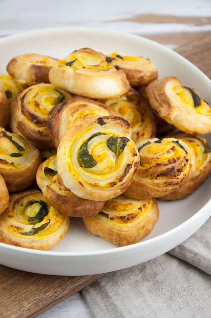 vegan pumpkin basil pinwheels on a plate