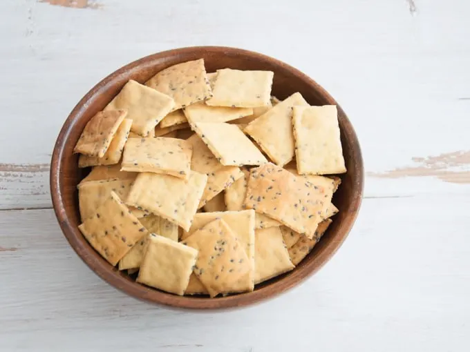 Gluten-free Vegan Chickpea Crackers Gluten-free Vegan Chickpea Crackers in a wooden bowl