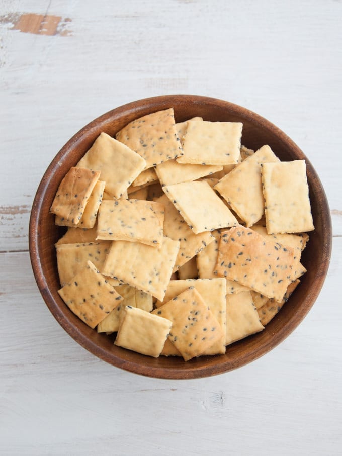 Gluten-free Vegan Chickpea Crackers in wooden bowl