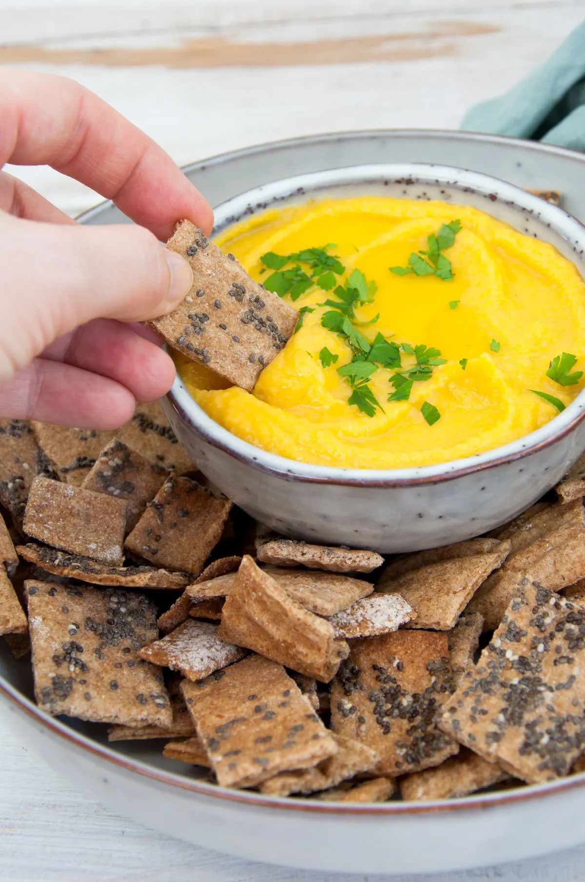 Vegan Spelt Chia Crackers dipped in Butternut Squash Dip