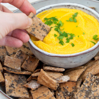 Vegan Spelt Chia Crackers dipped in Butternut Squash Dip