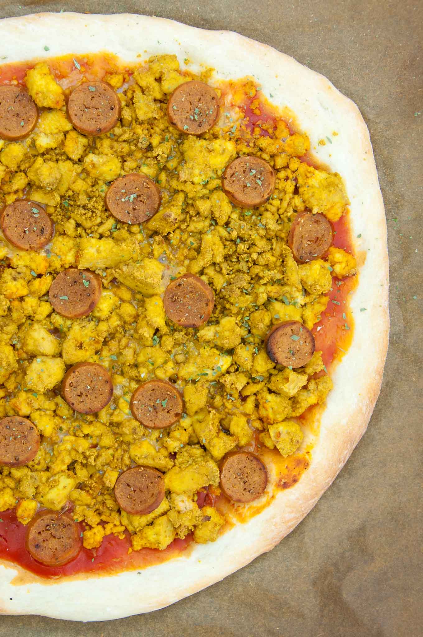 Vegan Breakfast Pizza with tofu scramble and seitan sausages