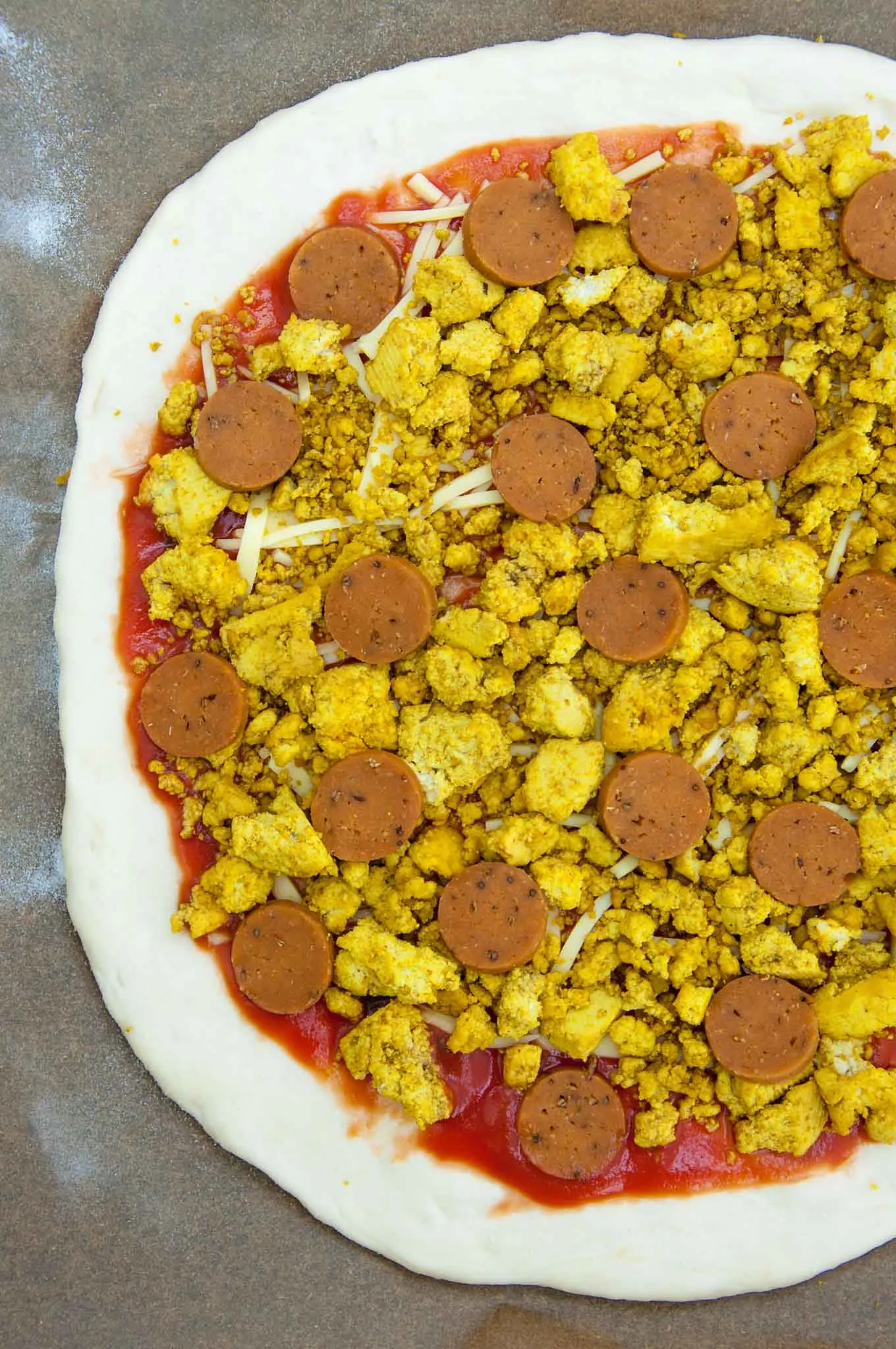 Vegan Breakfast Pizza with tofu scramble and seitan sausages