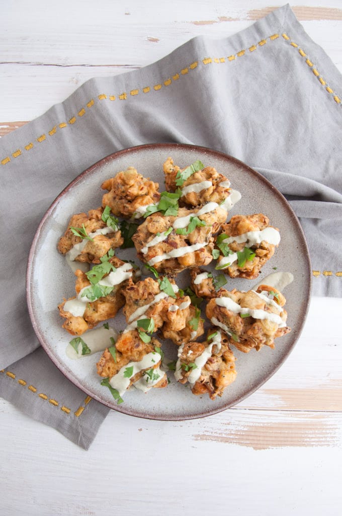 Veggie Pakora with Sweet Potato and Broccoli drizzled with Cilantro Coconut Sauce 