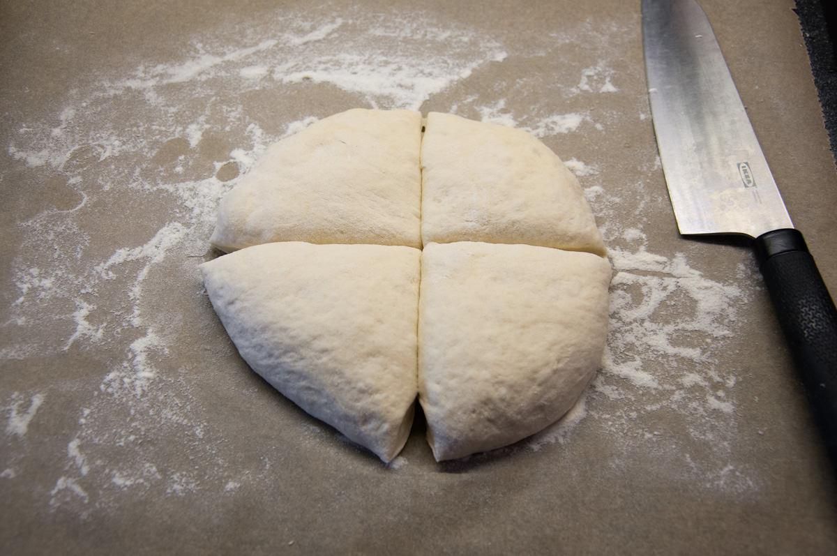 tortilla dough divided into 4 pieces