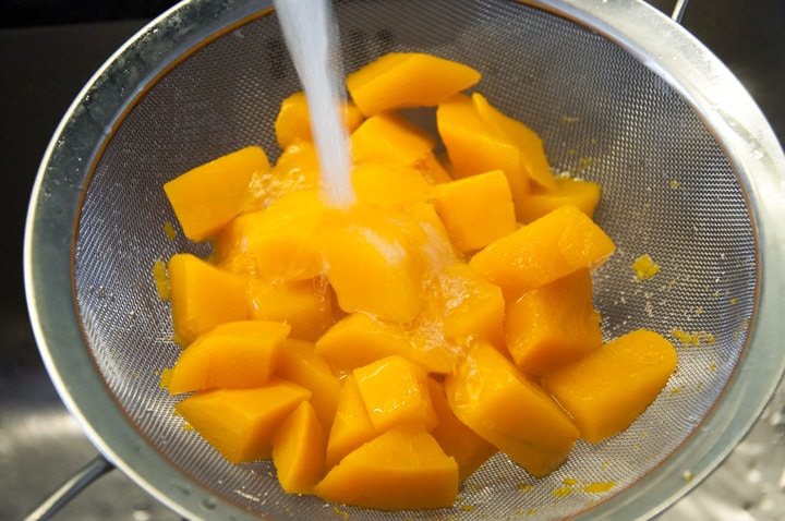 rinsing pumpkin chunks