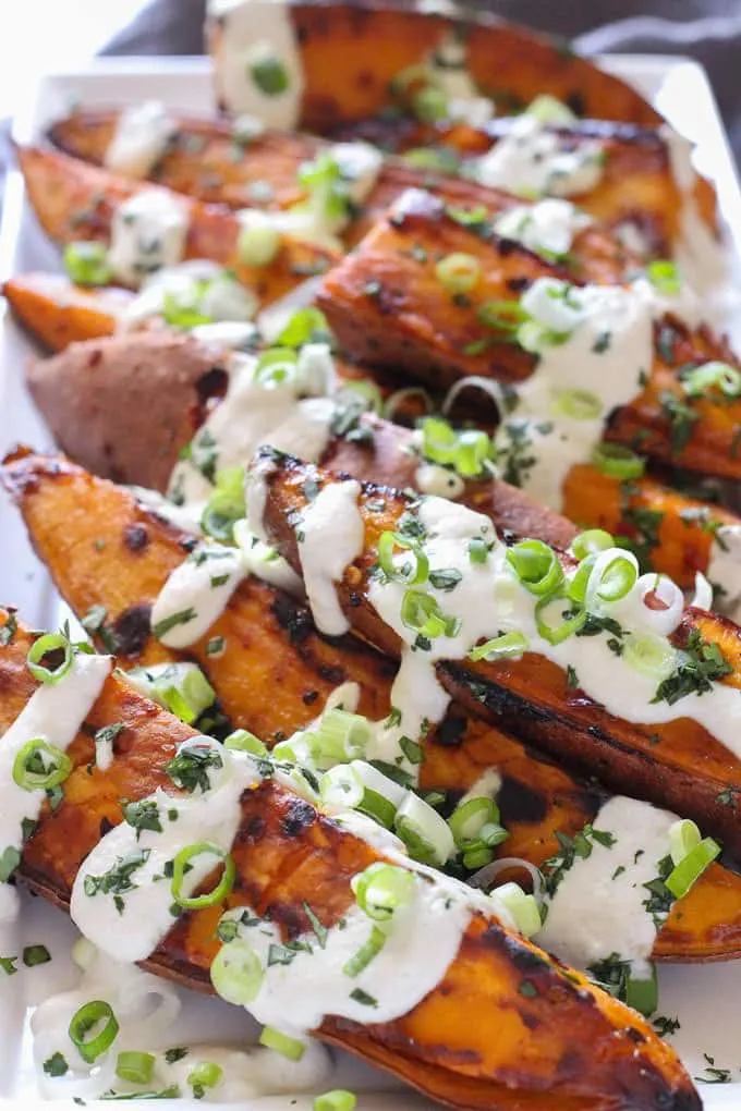 Roasted Yams with Lime Sunflower Seed Sauce - The Mostly Vegan