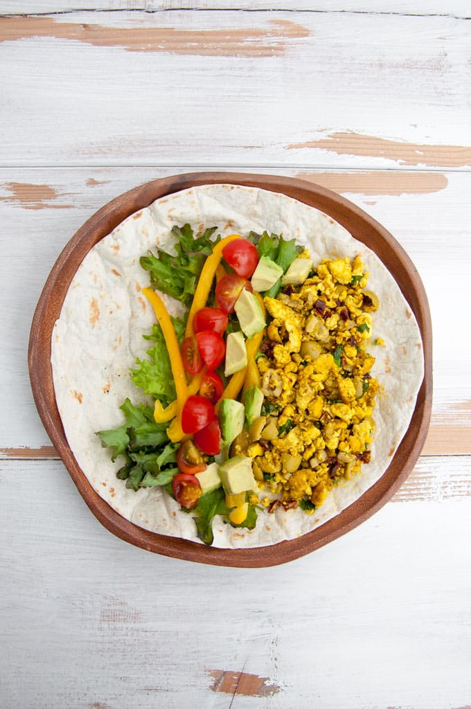 Mediterranean Tofu Scramble Breakfast Burrito | ElephantasticVegan.com