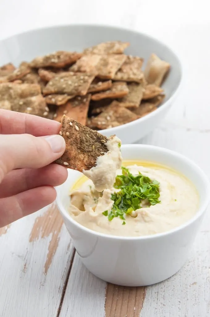 Vegan Za'atar Crackers dipped in hummus