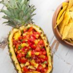 Vegan and Easy Pineapple Salsa in a whole pineapple