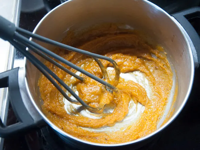 stirring flour into spiced butter