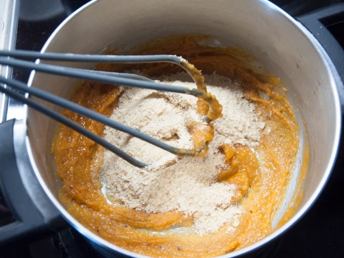 adding nutritional yeast to spiced butter