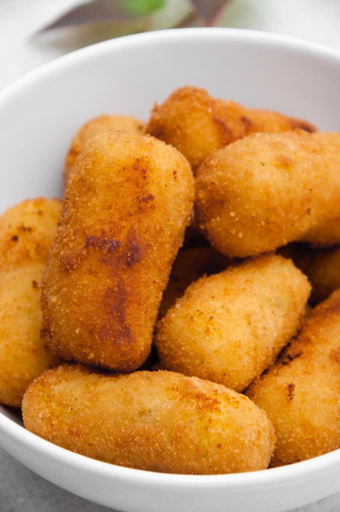 Golden Potato Croquettes in a white bowl