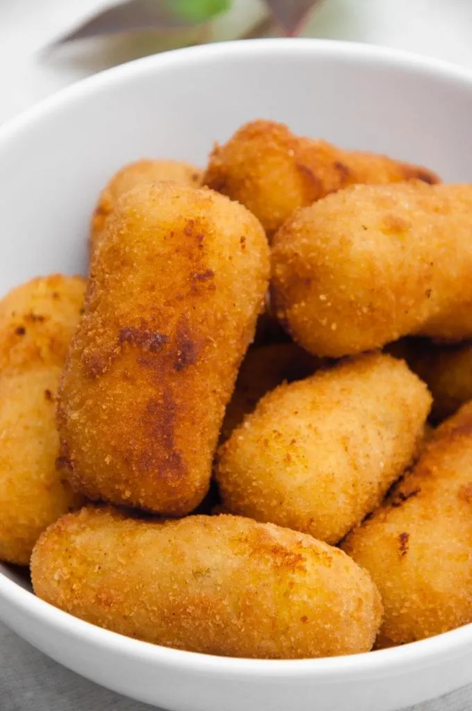 Golden Potato Croquettes in a white bowl