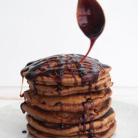 Vegan Gingerbread Pancakes drizzled with date syrup