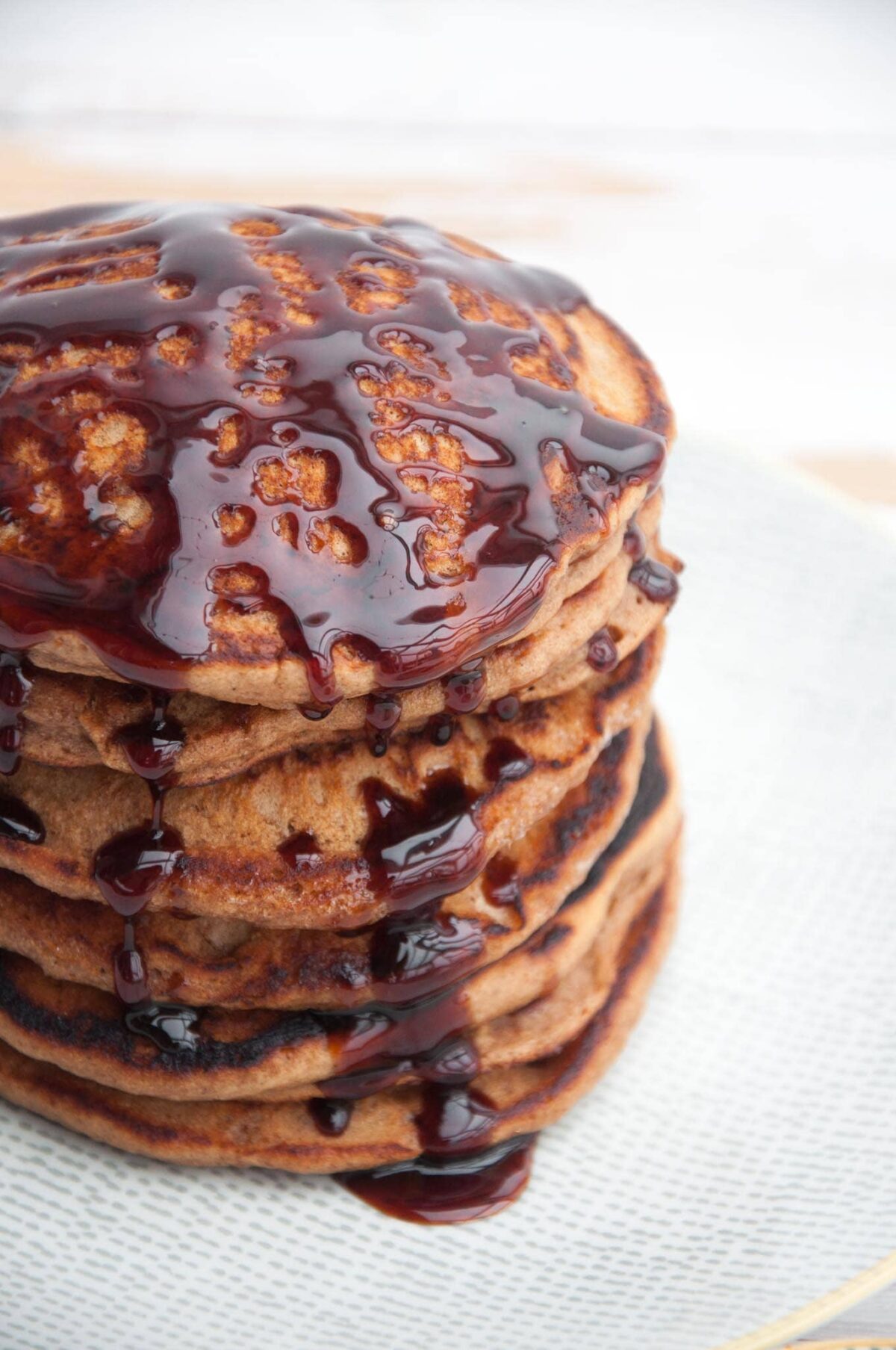 Vegan Gingerbread Pancakes drizzled with date syrup