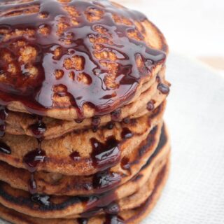 Vegan Gingerbread Pancakes drizzled with date syrup