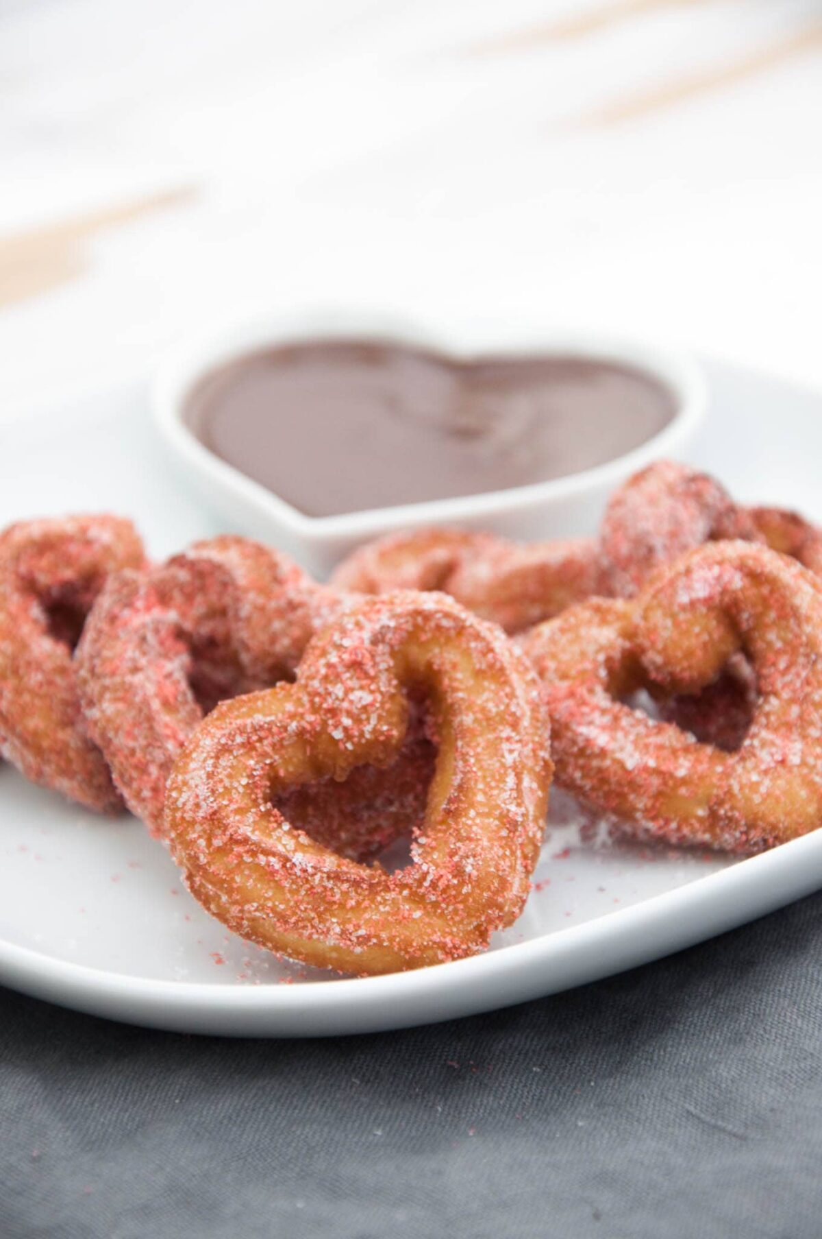 Heart-Shaped Churros coated in strawberry sugar