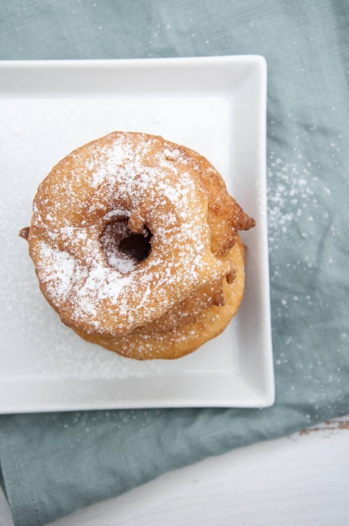 Vegan Apple Fritter Rings with powdered sugar