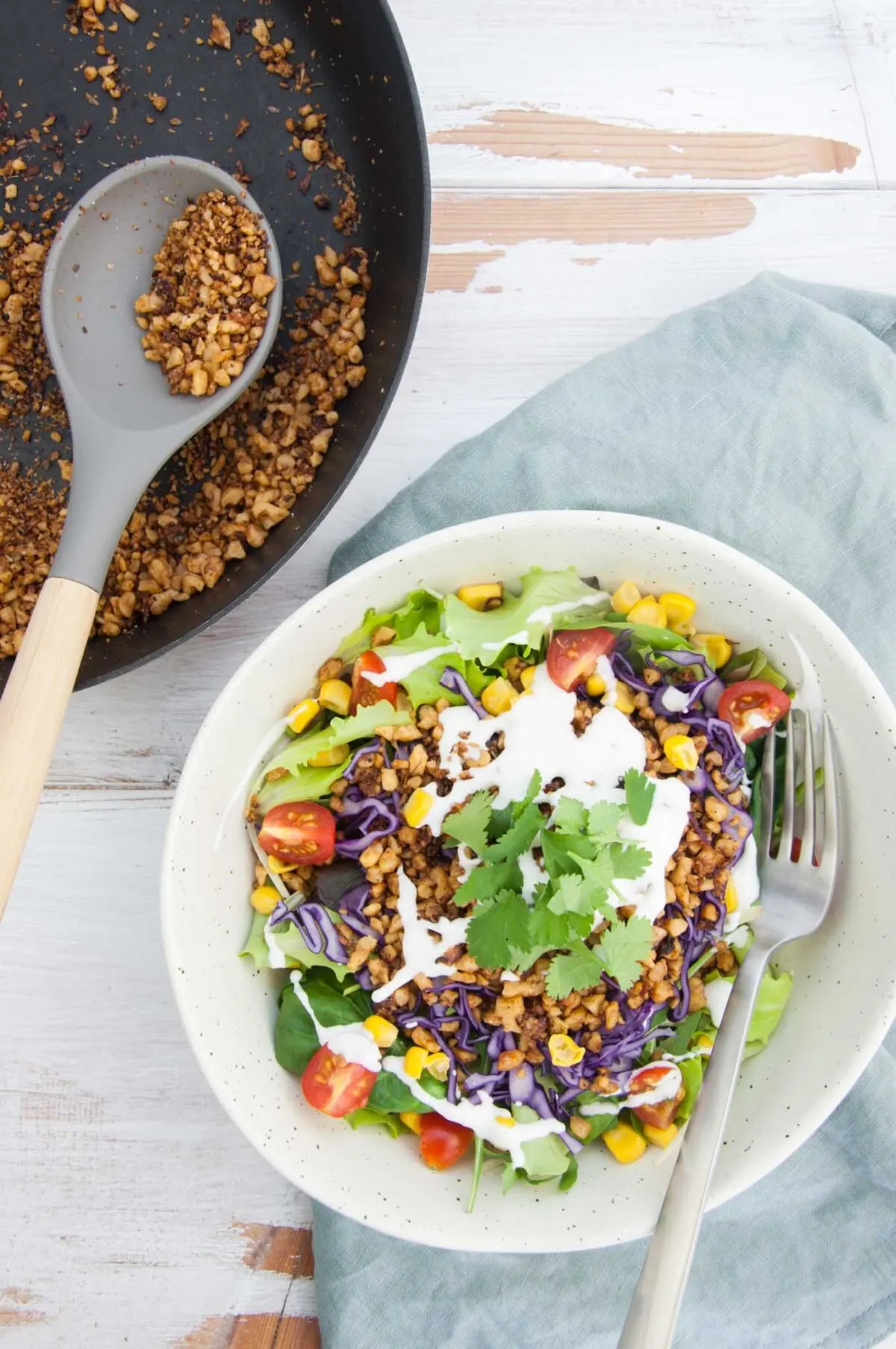 Vegan Taco Salad with Walnut Meat, corn, cabbage, tomatoes, vegan mayo and cilantro