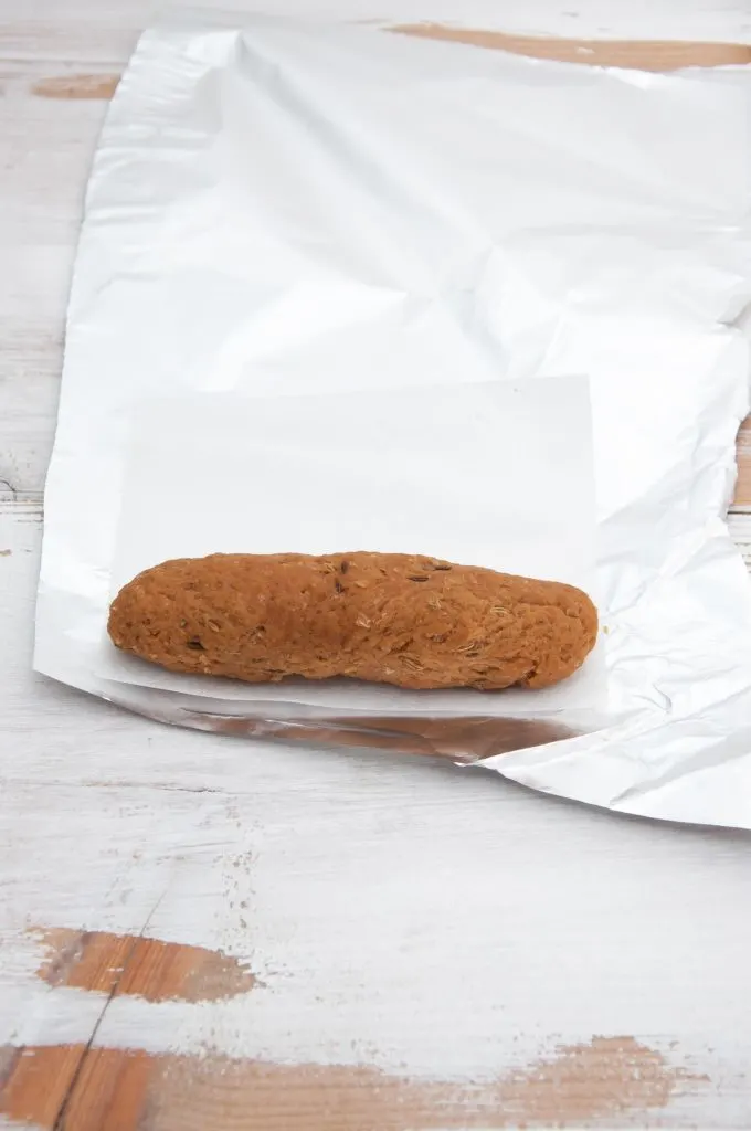 Homemade Vegan Sausages in parchment paper and aluminium foil