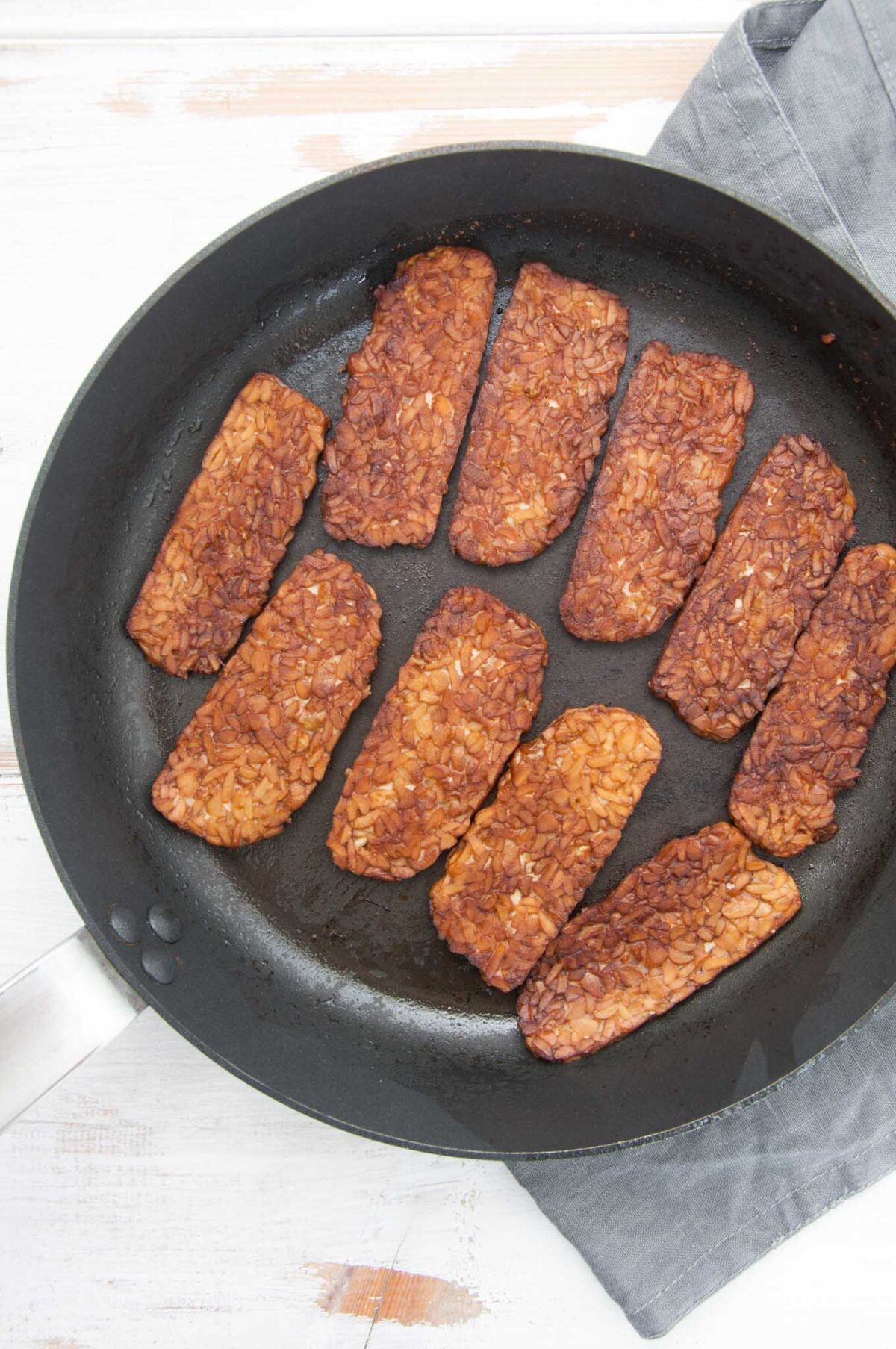 Vegan Tempeh Bacon in the pan